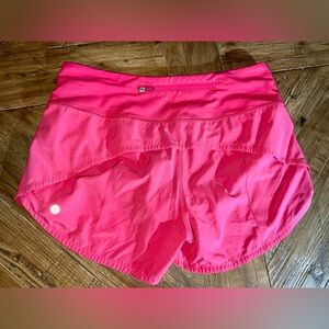 Lululemon Speed Up Shorts in size 6 in a shade of pink